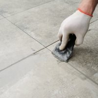 Grouting,Ceramic,Tiles.,Tilers,Filling,The,Space,Between,Tiles,Using