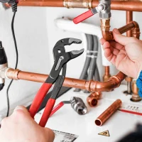 worker-repairing-the-plumbing-system